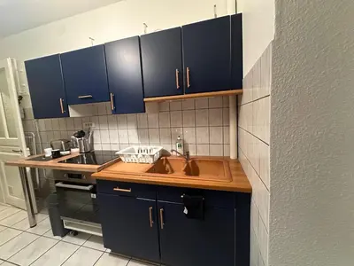 Cuisine ou kitchenette dans l'établissement Appartement RDC F3 centre ville