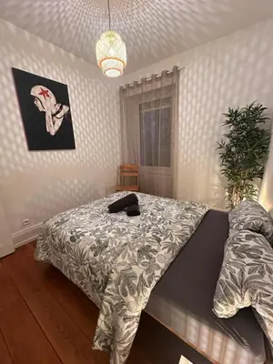 Un ou plusieurs lits dans un hébergement de l'établissement Appartement RDC F3 centre ville