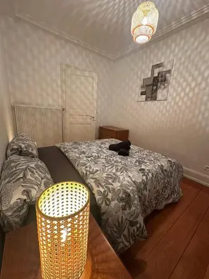 Un ou plusieurs lits dans un hébergement de l'établissement Appartement RDC F3 centre ville