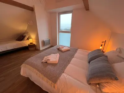Un ou plusieurs lits dans un hébergement de l'établissement Maison des 5 cépages - chez vigneron - jardin terrasse et parking