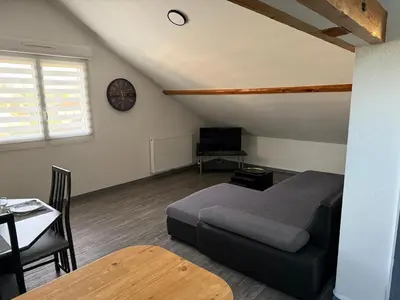 Coin salon dans l'établissement Quiet and bright apartment