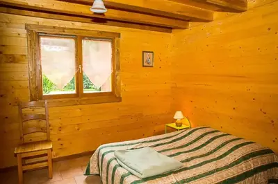 Un ou plusieurs lits dans un hébergement de l'établissement Chalet spacieux à Le Tholy avec vue montagne