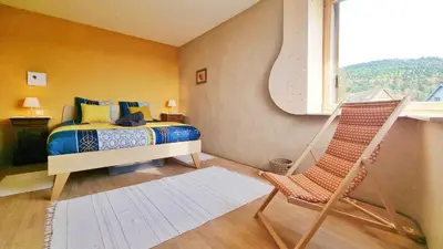Un ou plusieurs lits dans un hébergement de l'établissement Maison en bois au cœur de Thannenkirch