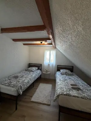 Un ou plusieurs lits dans un hébergement de l'établissement LE 16 - Très bel Appartement 3 chambres rénové pour 8 personnes