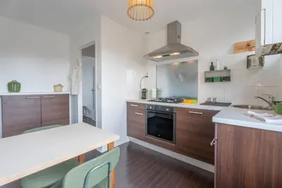 Cuisine ou kitchenette dans l'établissement Le Riedisheim Bel Appartement Gare Mulhouse