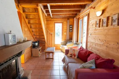 Coin salon dans l'établissement Chalet Maëlle - Évasion Nature à Gérardmer