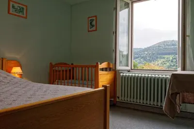 Un ou plusieurs lits dans un hébergement de l'établissement Gîte Edelweiss