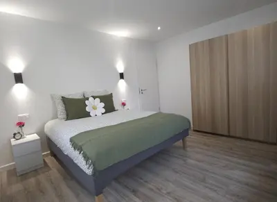 Un ou plusieurs lits dans un hébergement de l'établissement Appartement Familial- T3 LUXE- Borne VE- Recharging Station - 5min de la Gare- Colmar