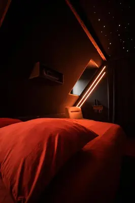 Un ou plusieurs lits dans un hébergement de l'établissement Le 7e Art Home
