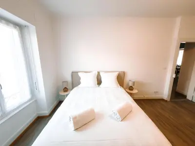 Un ou plusieurs lits dans un hébergement de l'établissement Appartement Hyper Centre Moderne - French Luxury