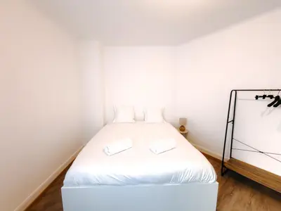 Un ou plusieurs lits dans un hébergement de l'établissement Appartement Hyper Centre Moderne - French Luxury
