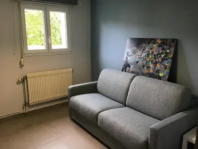 Coin salon dans l'établissement Une pause en Alsace