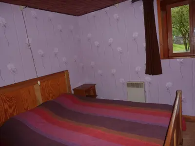 Un ou plusieurs lits dans un hébergement de l'établissement Holiday Home Vagney near Ski Gérardmer