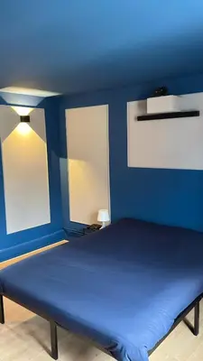 Un ou plusieurs lits dans un hébergement de l'établissement Cosy 4 - Belfort centre