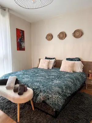 Un ou plusieurs lits dans un hébergement de l'établissement Hygge Colmar - Proche centre ville parking gratuit
