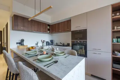 Cuisine ou kitchenette dans l'établissement Lodge Belle Hutte - Proche des Pistes