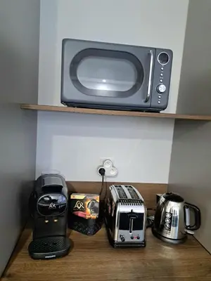 Cuisine ou kitchenette dans l'établissement Appartement cosy Colmar centre avec parking