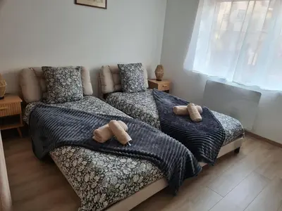 Un ou plusieurs lits dans un hébergement de l'établissement Appartement cosy Colmar centre avec parking