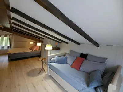 Coin salon dans l'établissement Chambre LA ZIMETTE, Le Balcon de la Zimette