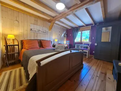 Un ou plusieurs lits dans un hébergement de l'établissement La Maison d'hôtes La Fesnel