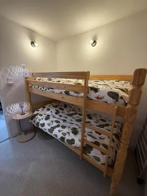 Un ou plusieurs lits dans un hébergement de l'établissement Appartement vu exceptionnel sur le lac 2