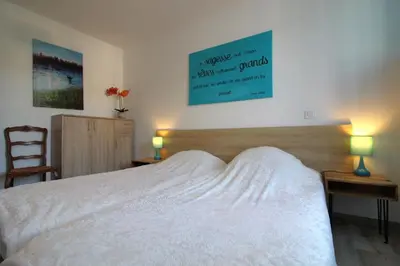 Un ou plusieurs lits dans un hébergement de l'établissement Gîte Millésime à Gérardmer Emplacement idéal tout