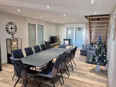 Coin salon dans l'établissement Maison Gite Le Randonneur