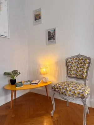 Coin salon dans l'établissement Au numero 5 - proche centre