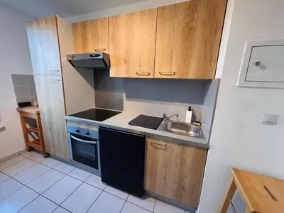 Cuisine ou kitchenette dans l'établissement L'appartement du Château