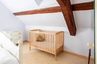Un ou plusieurs lits dans un hébergement de l'établissement Grande maison familiale à Kaysersberg-Vignoble