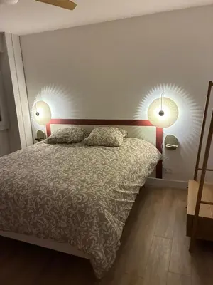 Un ou plusieurs lits dans un hébergement de l'établissement Chez nous Mulhouse - Hyper Centre - Parking - Balcon - Netflix