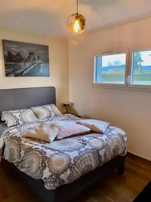 Un ou plusieurs lits dans un hébergement de l'établissement Chambre chez l'habitant