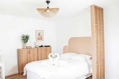 Un ou plusieurs lits dans un hébergement de l'établissement Chic Home - Turckheim