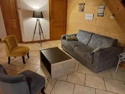 Coin salon dans l'établissement Chalet tout confort 1-7 personnes