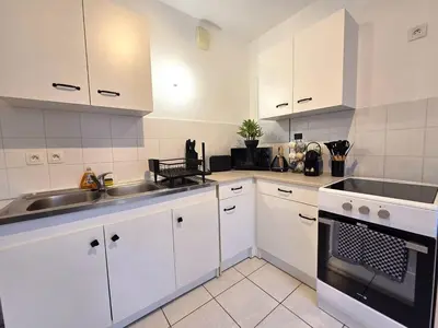 Cuisine ou kitchenette dans l'établissement Jazz & Colmar - T2 - Free Parking - Centre ville- Colmar