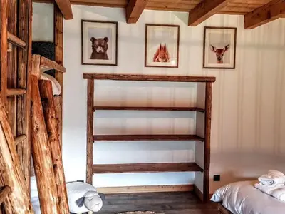 Un ou plusieurs lits dans un hébergement de l'établissement Holiday Home Le Pré des Biches by Interhome