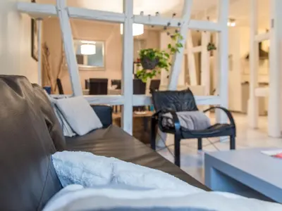 Coin salon dans l'établissement Apartment mit zwei Garagenstellplätzen by Interhome