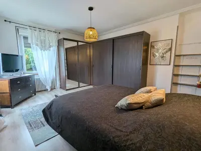 Un ou plusieurs lits dans un hébergement de l'établissement Chambres Eugène et Gabrielle, La Villa de Fraize