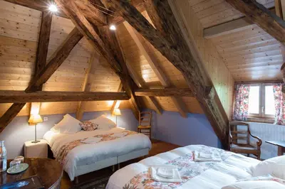 Un ou plusieurs lits dans un hébergement de l'établissement Hôtel le Morimont