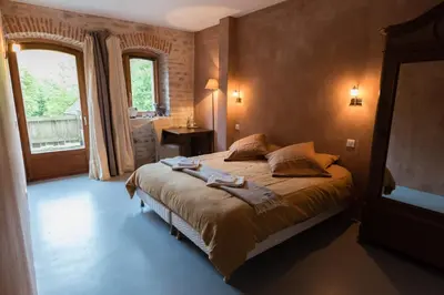 Un ou plusieurs lits dans un hébergement de l'établissement Hôtel le Morimont