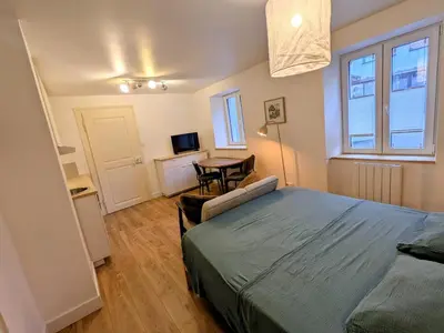 Un ou plusieurs lits dans un hébergement de l'établissement Le studio du rempart, appartement cosy au coeur de village