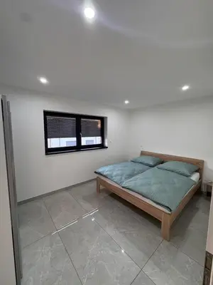 Un ou plusieurs lits dans un hébergement de l'établissement Maison spacieuse au cœur de l'Alsace