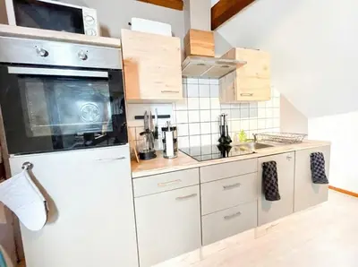 Cuisine ou kitchenette dans l'établissement Duplex de Charme - Turckheim - Route des Vins