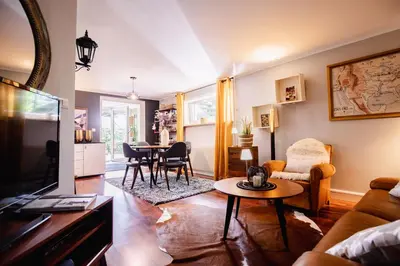 Télévision ou salle de divertissement dans l'établissement Appartement cosy avec jardin privatif classé 4 étoiles