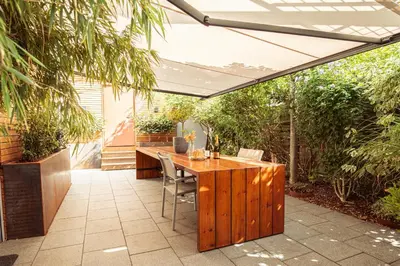 Jardin de l'établissement Appartement cosy avec jardin privatif classé 4 étoiles