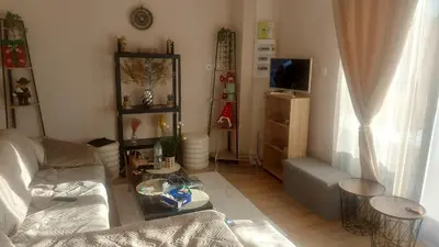 Télévision ou salle de divertissement dans l'établissement La belle vue