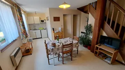 Cuisine ou kitchenette dans l'établissement Au petit bonheur