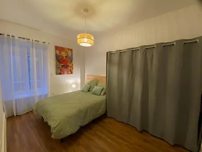 Un ou plusieurs lits dans un hébergement de l'établissement Bright and spacious apartment, Belfort center