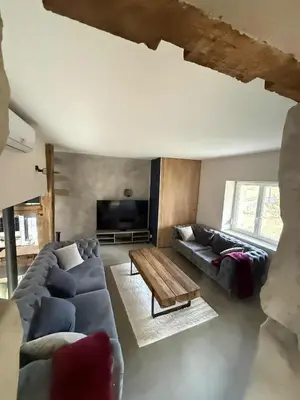 Coin salon dans l'établissement Ancienne ferme rénovée