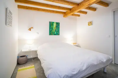Un ou plusieurs lits dans un hébergement de l'établissement Au nid d'Alsace - SPA et sauna privé